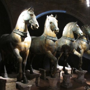 Italy. Original bronze quadriga of horses sculpture in St. Mark's Basilica, Venice. 2011