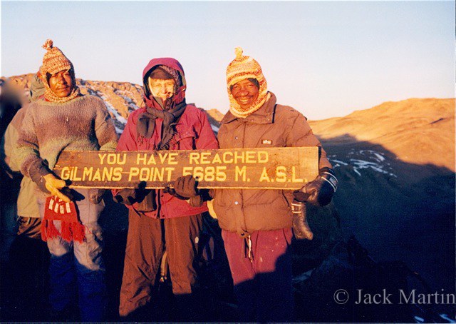 I really made it! Me, with our guides at Gilman's Point atop Mt. Kilinmajaro, 1997